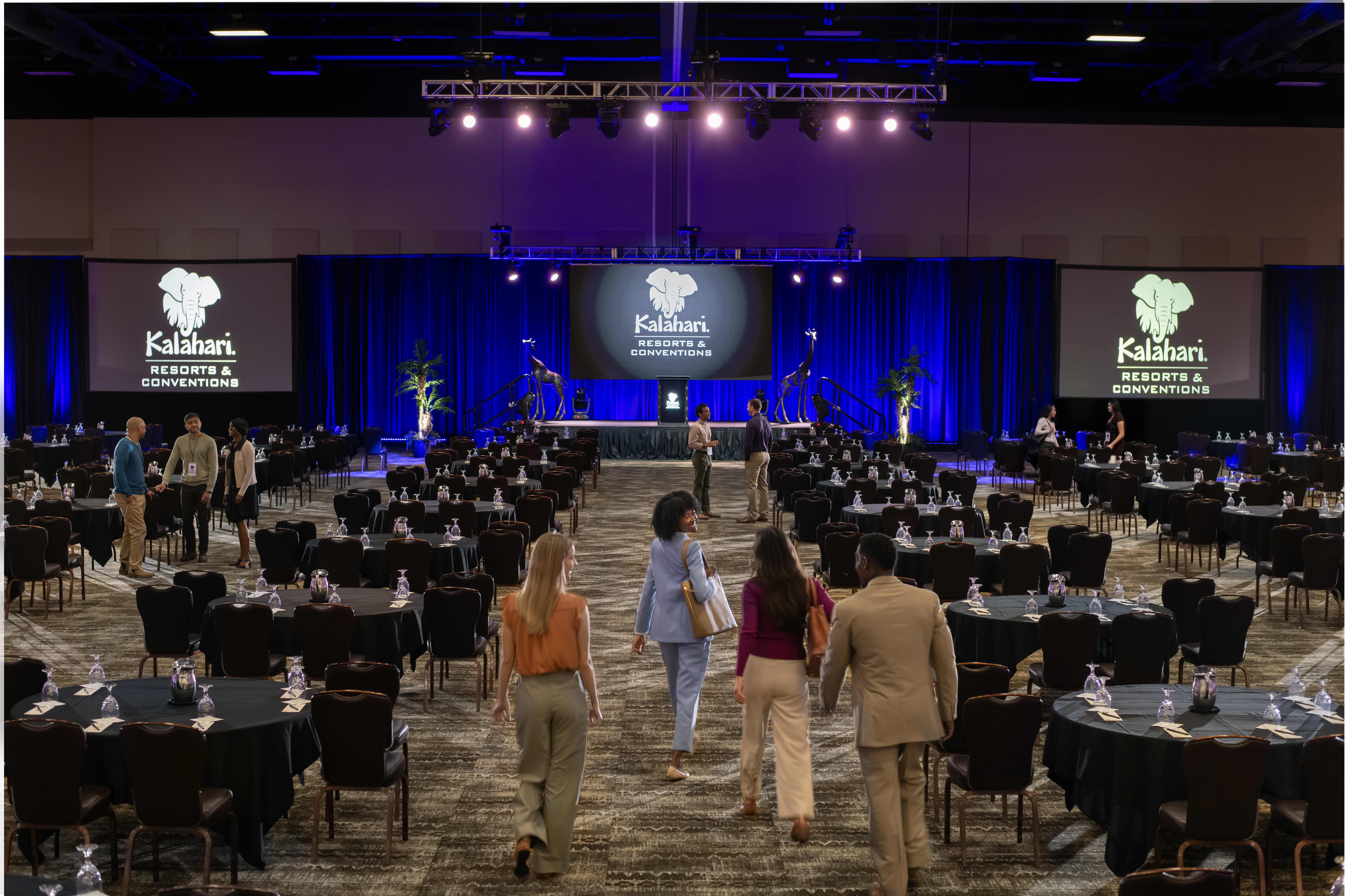 People walking into conference