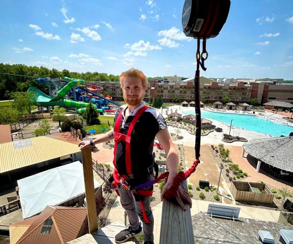 Guy ready to jump on free fall tower