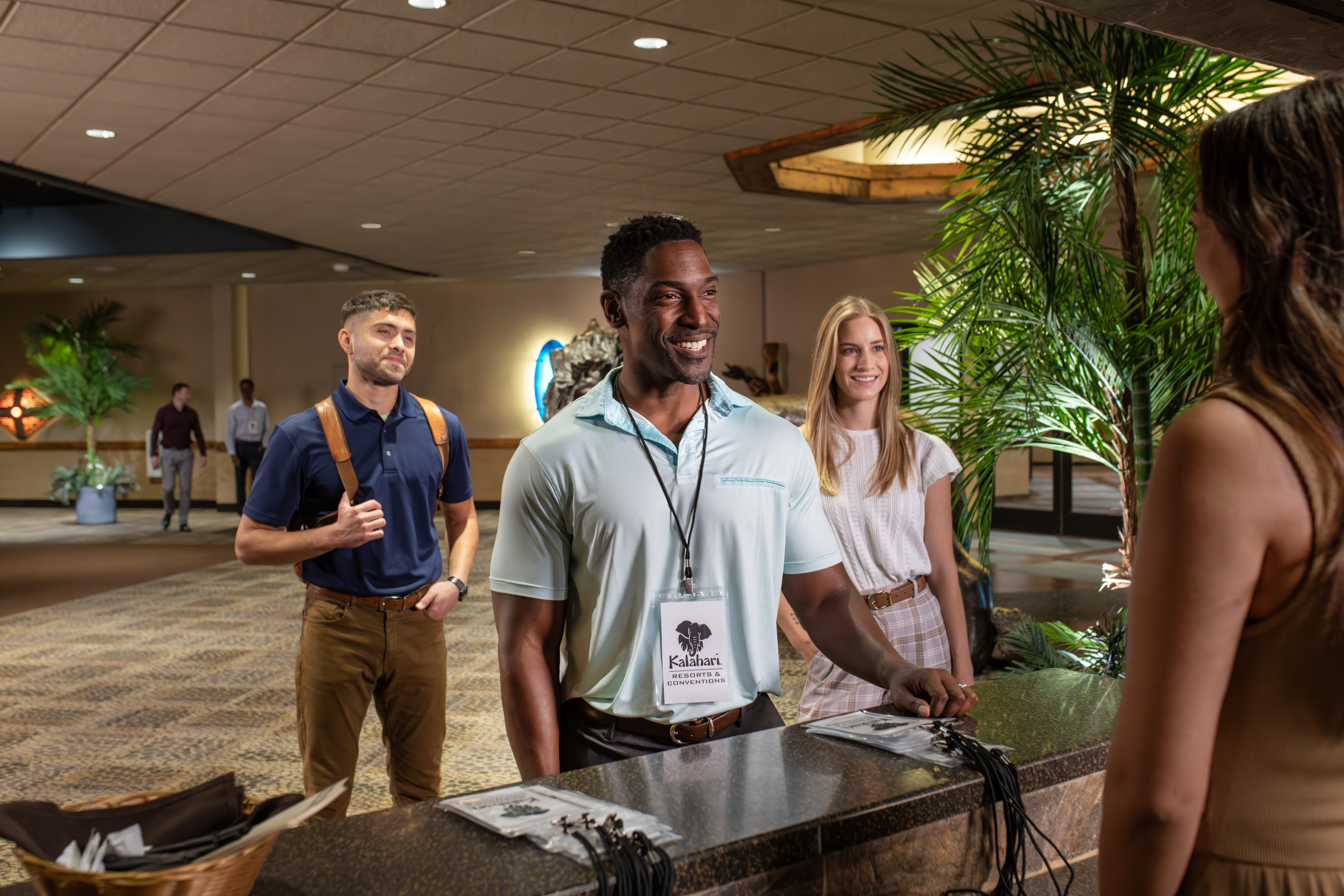 people checking in at conference