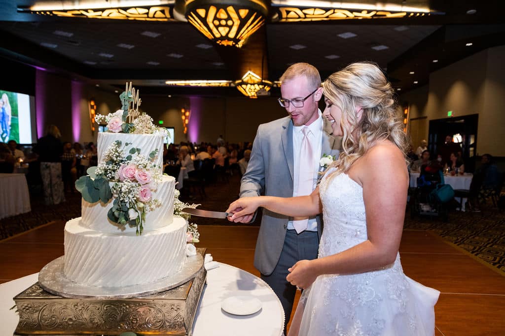 Couple Cutting the wedding cake
