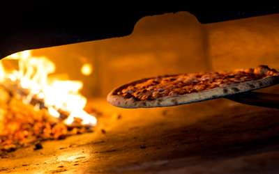 Pizza in a wood fire over in Sortino's Italian Kitchen